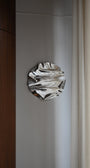 Round Psychedelic Mirror 50 cm — close-up detail of hand-shaped polished steel