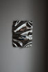 Psychedelic Mirror 35*50 cm by Caia Leifsdotter — hand-shaped polished steel, front view