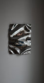 Psychedelic Mirror 35*50 cm by Caia Leifsdotter — hand-shaped polished steel, front view