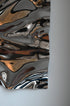 Psychedelic Mirror 35*50 cm — hand-shaped polished steel, angle view showing craftsmanship