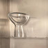 Clear glass bowl on a metallic surface
