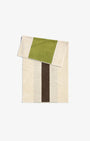 Brown towel from Suite 702 with lime accents, showing soft fabric texture and folded neatly for display.