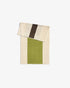 Brown towel from Suite 702 with lime accents, soft fabric, and a textured surface, perfect for bath or beach use.