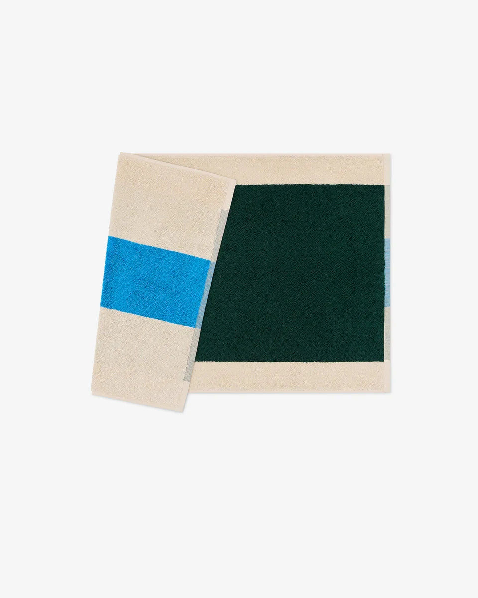 Dark green bath mat from Suite 702, Aqua color, 50x80 inches, soft and plush with textured surface for bathroom comfort.