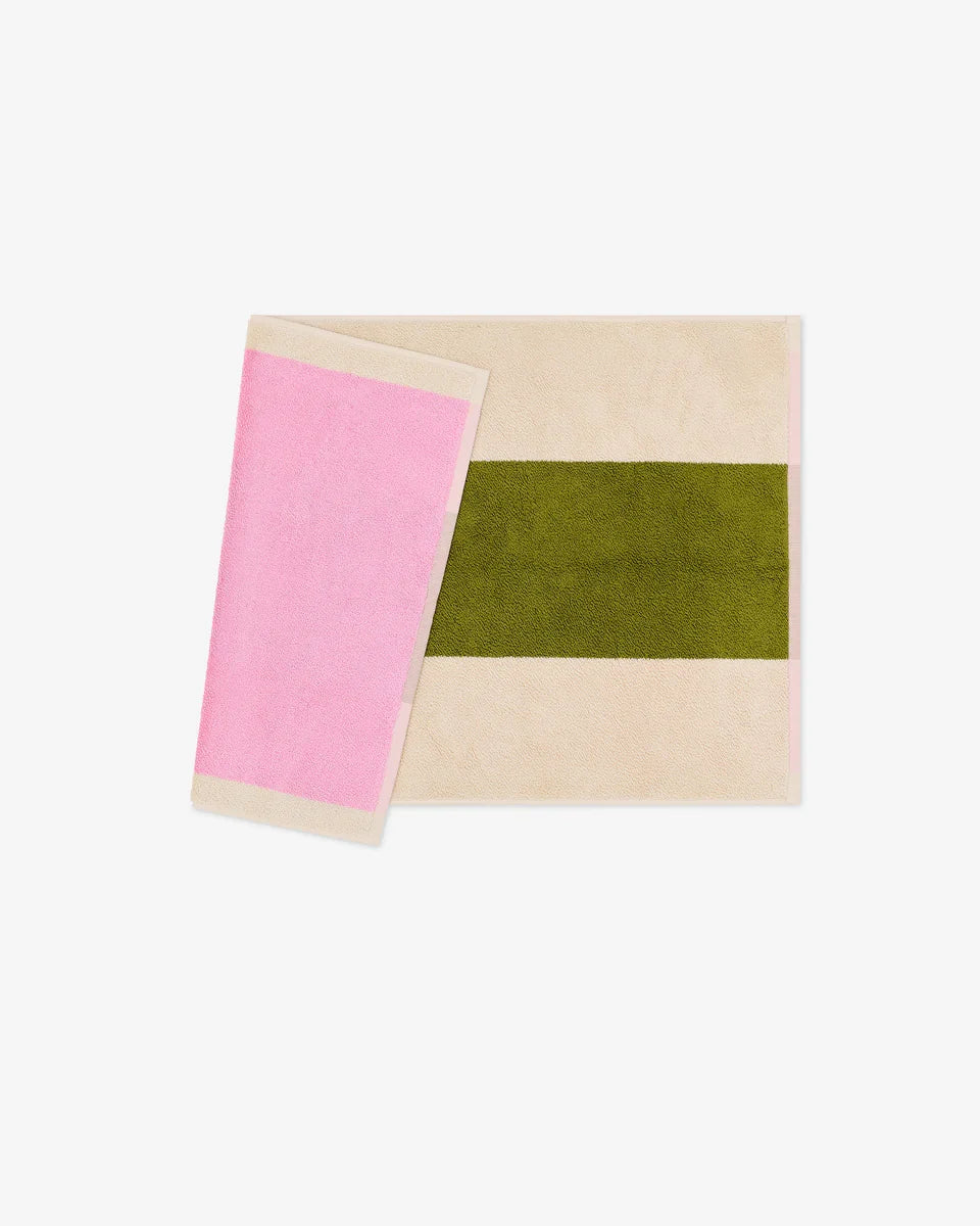 Pink Olive bath mat from Suite 702, 50x80 inches, featuring soft, plush fabric and a decorative design for bathroom comfort.