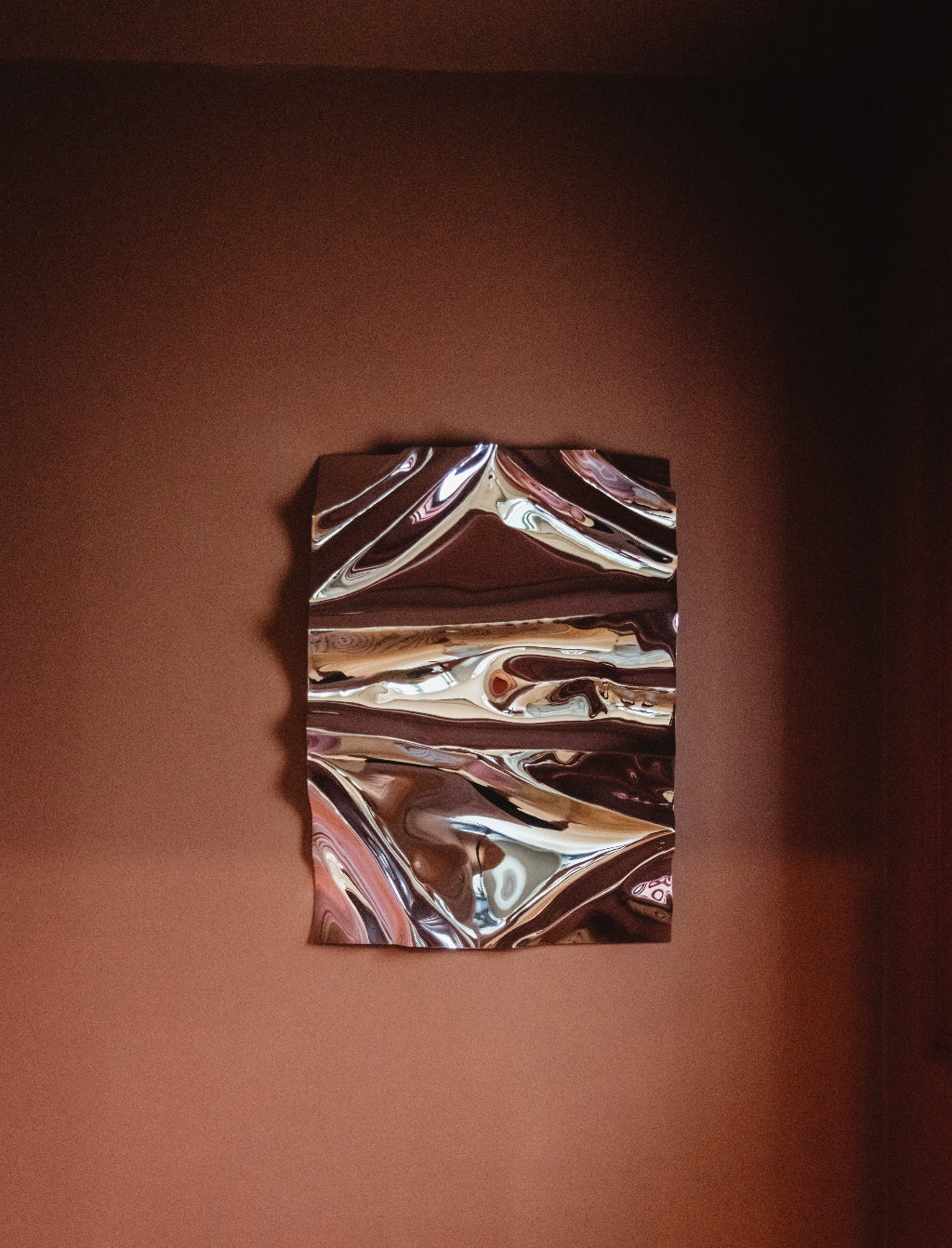 Psychedelic Mirror 50*70 cm — close-up detail of hand-shaped polished steel